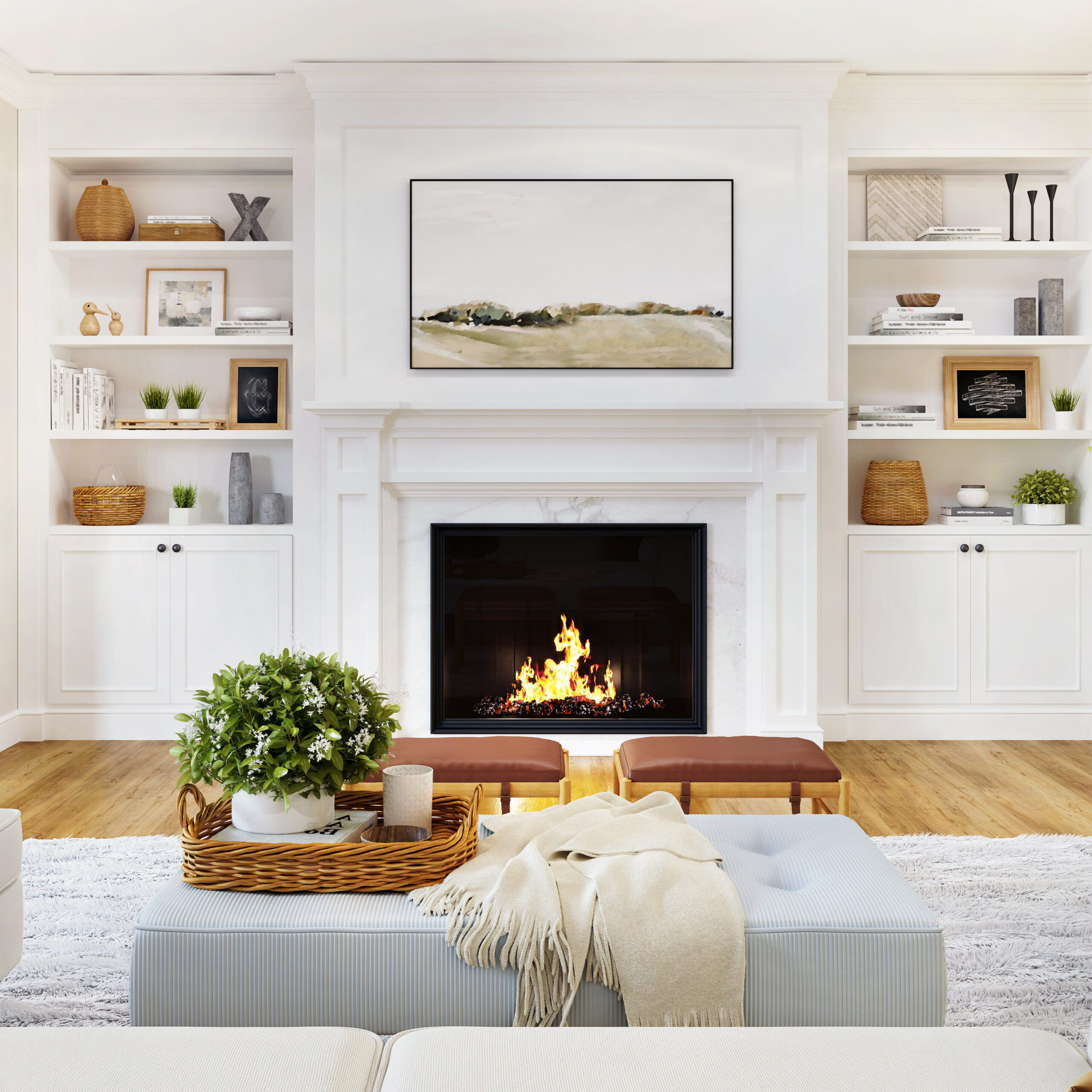 A bright, modern living room with a burning fireplace surrounded by white built-in shelves. The space includes a beige sofa, a large rug, and natural light streaming through large windows. Decor includes plants, books, and artwork.